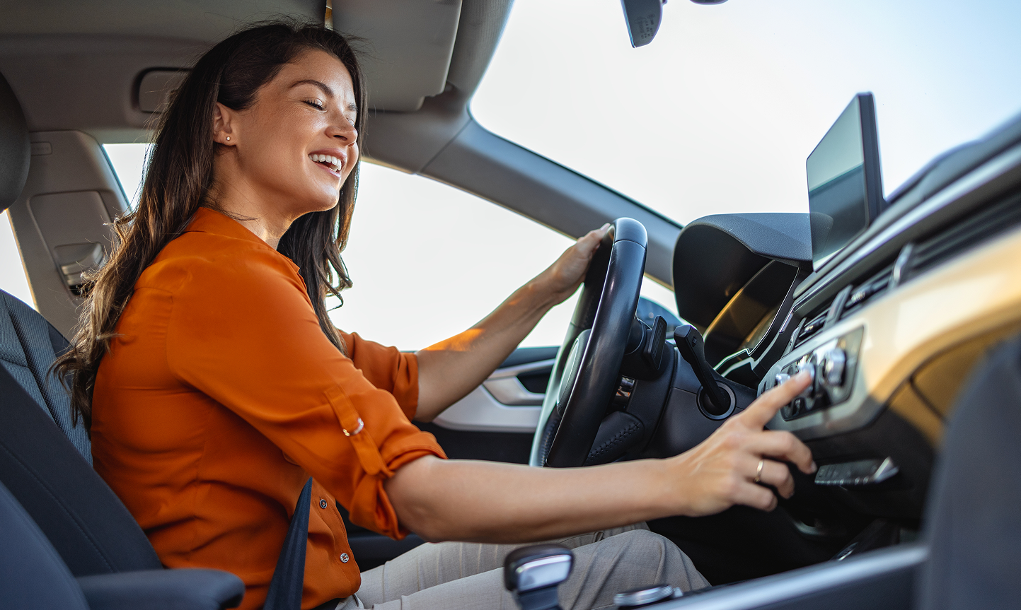 women driving car