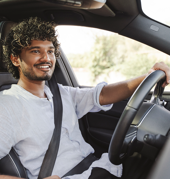 man driving car